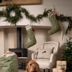 Juniper Berry Wreath -Sophie Allport all101590 all101595 lin101401 rw101000ct robin Christmas sack stocking cushion wrapping paper dog lounge portrait lifestyle high res 1 d3cb5a02 b4aa 45ff 9c6d ce0a5f3b41b1