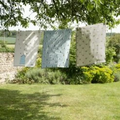 Bees Linen Tea Towel -Sophie Allport all80601set lin36601 bees teal and bees linen tea towel set of 2 lifestyle high res square