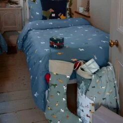 Christmas Dogs Knitted Cushion -Sophie Allport all87590 all87595 christmas dogs christmas sack and christmas stocking lifestyle high res square d5ba5b21 e723 4ffa 924e b1109733a342