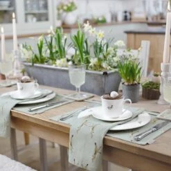 Boxing Hares Fabric Placemat -Sophie Allport boxing hares table setting easter 2 lifestyle high res square b86c4e2d 2159 4612 b33b 483afe3c82ae