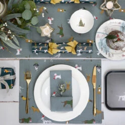 Christmas Dogs Napkins (Set Of 4) -Sophie Allport christmas dogs table setting portrait lifestyle high res square 0a7c43c4 08b4 4f47 9bd9 f385e89501c9