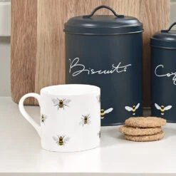 Bees Mug -Sophie Allport im3603 bees white large mug lifestyle high res square