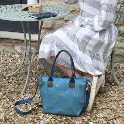 Bees Teal Mini Oundle Bag -Sophie Allport poly80020m bees teal oundle bag mini 3 lifestyle high res square